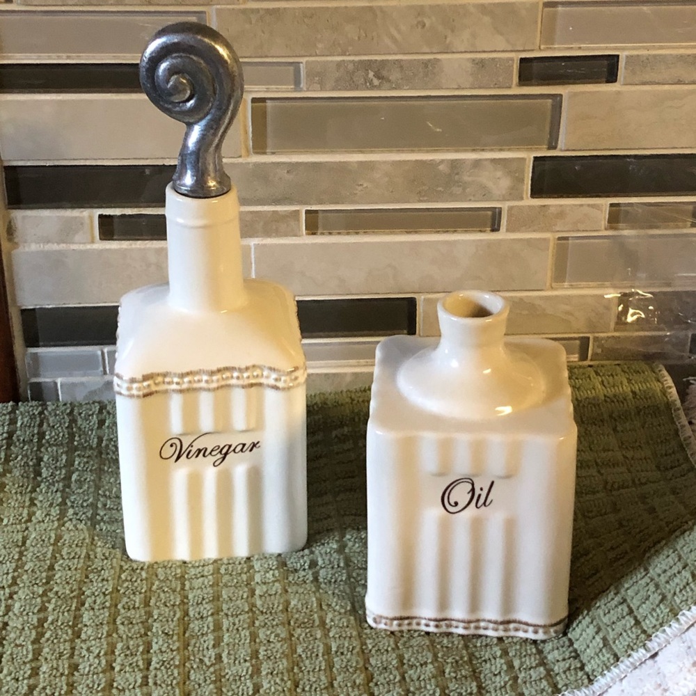 Vinegar and oil containers by home interiors